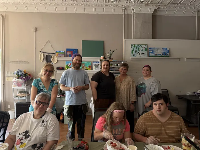 Artists and staff gathered together in the Main View Gallery & Studio